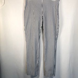 A New Day - Blue and white striped Capri pant. Stretchy zip up side. Size 4